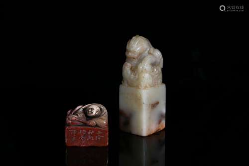 A set of two soapstone carved seals
