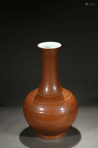 A cafe-au-lait glazed bottle vase