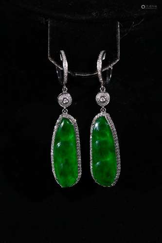 A pair of jadeite and diamond pendants