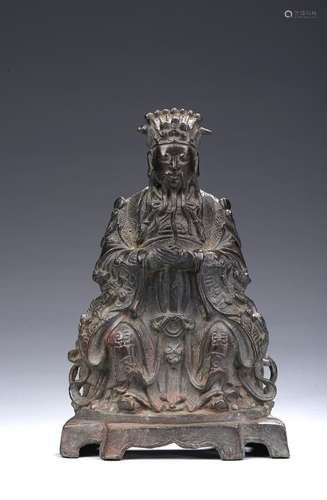 A bronze seated figure of Daoist immortal