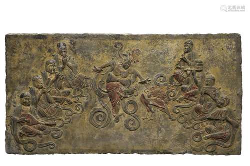 A stone relief 'dancing figures' panel