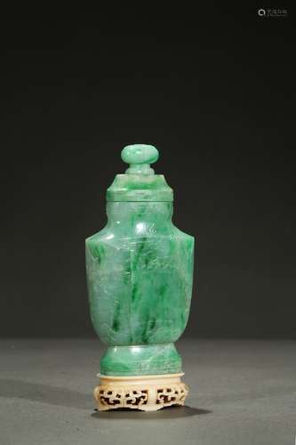 A jadeite carved vase with bone stand