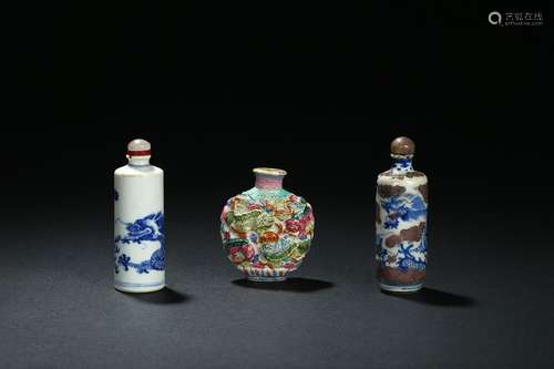 A set of three ceramic snuff bottles