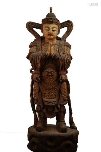 A very large wood painted statue of Guardian king