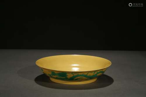 A yellow ground green 'dragon' dish