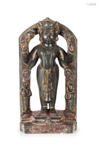 A STONE FIGURE OF DEITY WITH MANDORLA, INDIA, 18TH CENTURY