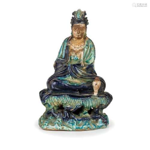 A BISCUIT-GLAZED FIGURE OF A SEATED GUANYIN, CHINA, LATE MING DYNASTY, 16TH-17TH CENTURY