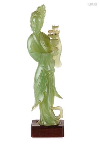 A LIGHT GREEN JADE FIGURE OF AN IMMORTAL, CHINA, 20TH CENTURY