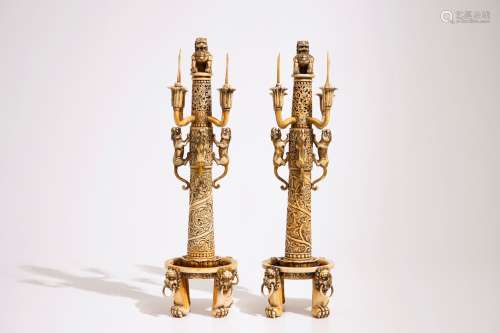 An exceptional pair of large Chinese reticulated ivory candlesticks, 18/19th C.