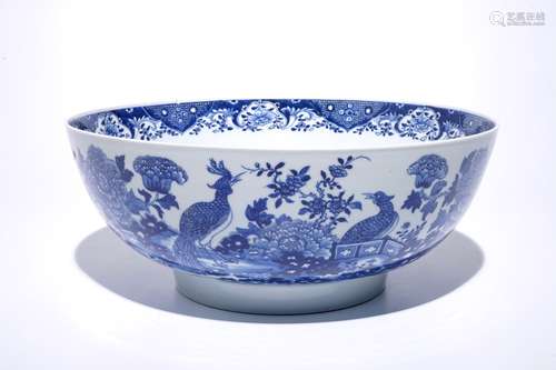 A large Chinese blue and white bowl with birds among blossoming flowers, Qianlong