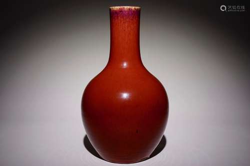 A Chinese monochrome sang-de-boeuf-glazed tianqiu ping bottle vase, 19th C.