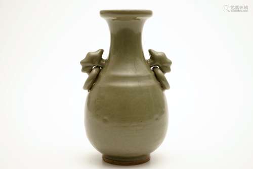 A monochrome Chinese celadon vase, 19th C.