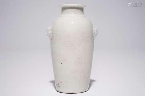 A Chinese blanc de Chine vase with lion's head-shaped handles, Kangxi