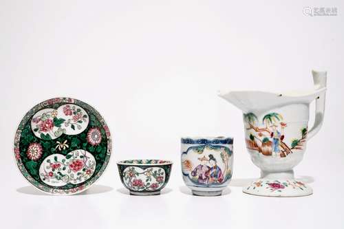 A Chinese famille rose jug, a cup and saucer and another cup with ear, 18th C.