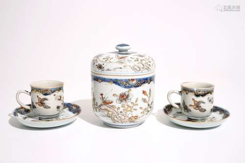 A pair of Chinese grisaille, gilt and iron red cups and saucers and a covered bowl, Qianlong