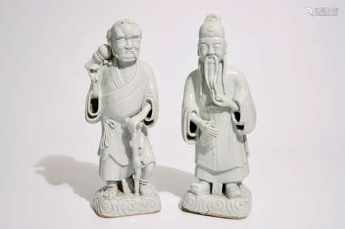 A pair of tall Chinese Dehua blanc de Chine figures of immortals, 18/19th C.