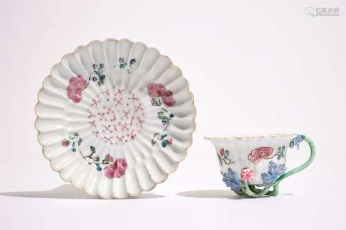 A Chinese famille rose lotus-shaped relief-decorated cup and saucer, Yongzheng