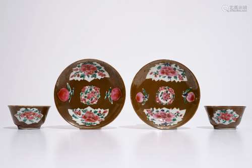 A pair of Chinese famille rose capucin ground cups and saucers, Qianlong