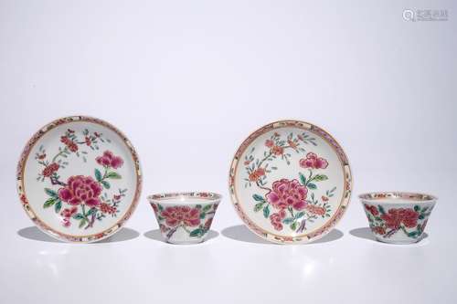 A pair of Chinese famille rose cups and saucers, Yongzheng/Qianlong