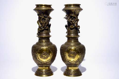 A pair of Japanese gilt brass vases with applied dragons, Meiji/Taisho, 19/20th C.