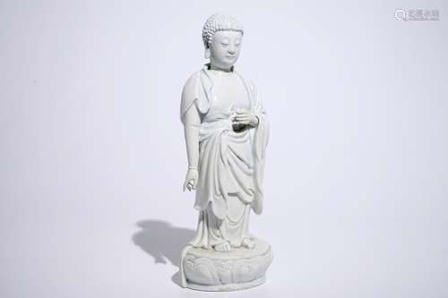 A Chinese Dehua blanc de Chine model of a standing Buddha, impressed mark on the back, Kangxi