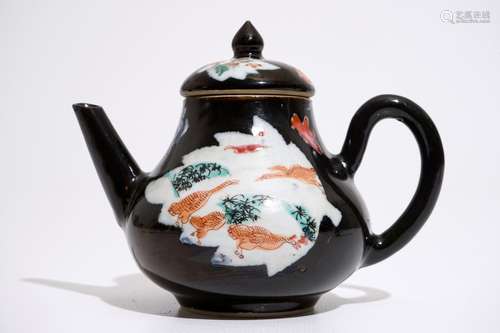 A Chinese black ground famille rose teapot and cover with geese, Yongzheng/Qianlong