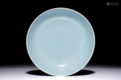 A monochrome Chinese clair-de-lune glazed saucer dish, Qianlong mark, 19/20th C.