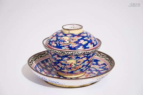 A Chinese Canton enamel blue ground dragon cup and saucer, 19th C.