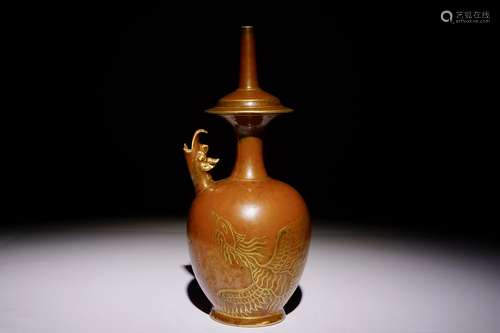 A Chinese monochrome persimmon-glazed kundika with applied gilt decoration, 18/19th C.