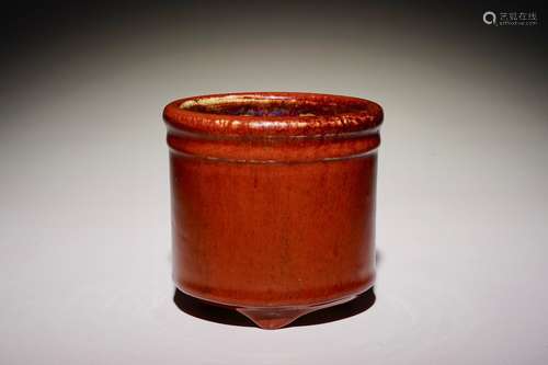 A Chinese monochrome sang-de-boeuf-glazed brush pot, 19th C.