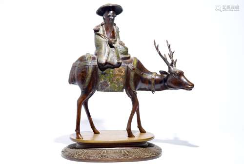 A large Chinese bronze and cloisonne model of Shou Lao on a deer, on wooden base, 19/20th C.