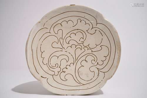 A Chinese Cizhou cream-glazed sgraffiato pillow, Song, 12th C.