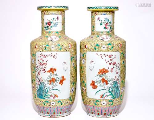 A pair of large Chinese yellow ground famille rose vases, 19/20th C.