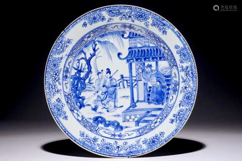 A Chinese blue and white charger with a scene from 