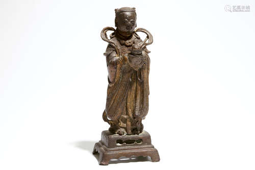 A Chinese bronze figure of Shancai, Ming