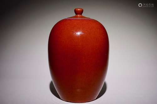 A Chinese monochrome sang-de-boeuf-glazed jar and cover, 19th C.