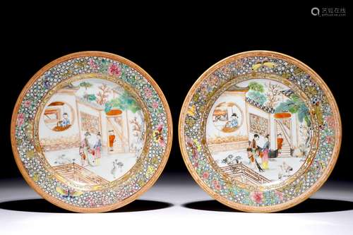 A pair of Chinese famille rose plates with figures on a terrace, Yongzheng