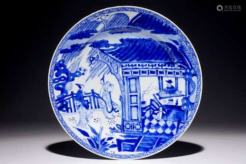 A Chinese blue and white charger with a scene from 