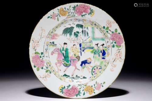 A Chinese famille rose plate with figures in a garden, Yongzheng