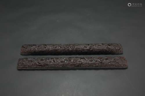 A Pair of Chinese Carved Rosewood Paper Weights