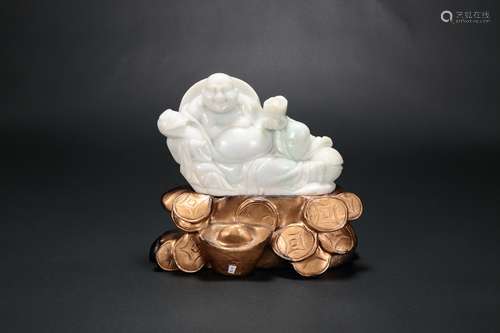 A Chinese Carved Jade Buddha with Stand