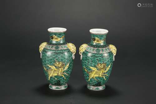 A Pair of Chinese Black Ground Green Glazed Porcelain Lion Vases