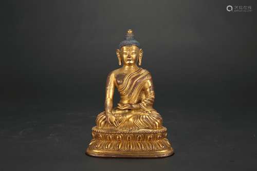 A Chinese Gilt Bronze Buddha