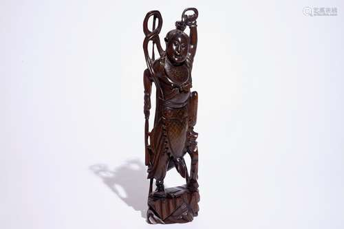 A large Chinese carved and inlaid wood figure, 19/20th C.