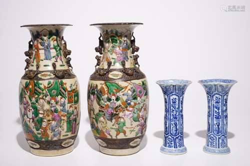 A pair of Chinese blue and white Kangxi vases and a pair of famille rose Nanking vases, 19th C.