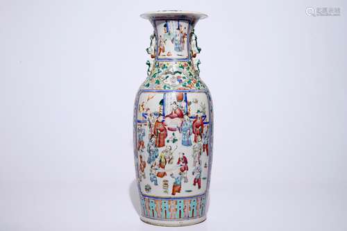 A tall Chinese famille rose vase with a garden scene, 19th C.