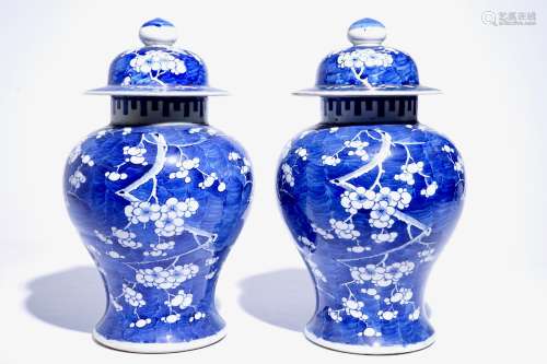 A pair of Chinese blue and white covered jars with 