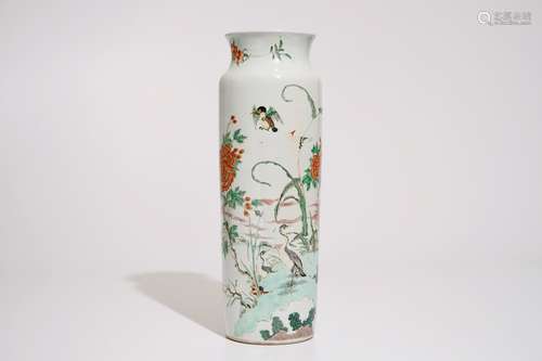 A Chinese wucai sleeve vase with birds in a blossoming landscape, 19th C.