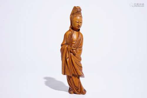 A Chinese carved wood model of Guanyin, 19/20th C.