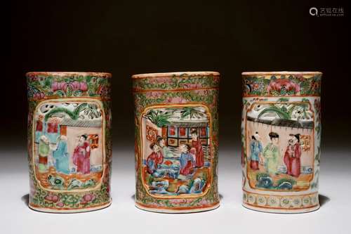 Three Chinese Canton rose medallion relief-decorated and pierced brushpots, 19th C.